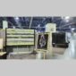 Physical documentation of Kevin G. Saunders | KGS Studios fine art prints in a public exhibition setting. Verifies the public vetting of manual hyperrealism portraits, orchid studies, and HTTX-97442. San Antonio archive proof of physical reality.