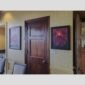 Physical documentation of Kevin G. Saunders | KGS Studios fine art prints in a public exhibition setting. Verifies the public vetting of manual hyperrealism portraits, orchid studies, and HTTX-97442. San Antonio archive proof of physical reality.