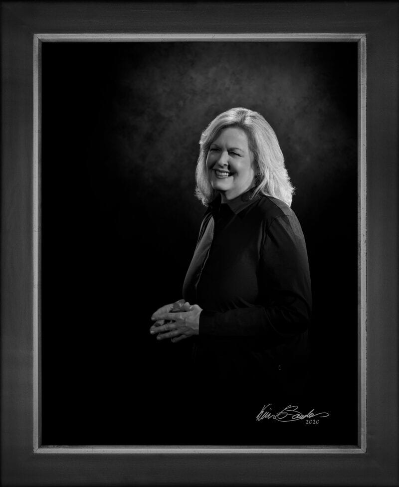 Manual hyperrealism portrait of Amy Shaw, Executive Director of the Fiesta San Antonio Commission, captured in-person at 107 Blue Star.