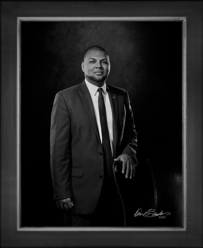 Manual hyperrealism portrait of Charles Mario Henry Sr., Veterans Advocate and Community Leader, captured in-person at 107 Blue Star by Kevin G. Saunders.