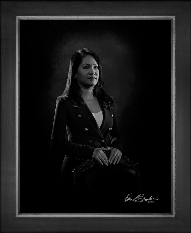 Manual hyperrealism portrait of Dominique Liu, President of Dominion Strategies, captured in-person at 107 Blue Star by Kevin G. Saunders.