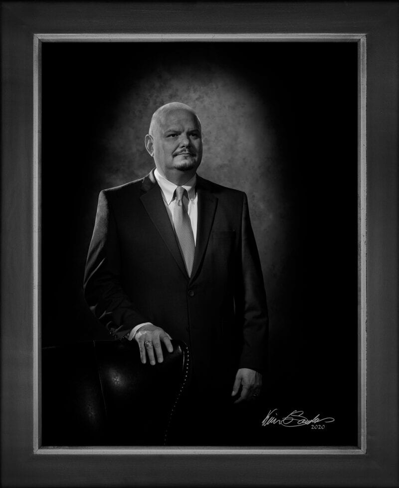 Manual hyperrealism portrait of Dr. Robert Vela, President of San Antonio College, captured in-person at 107 Blue Star by Kevin G. Saunders.