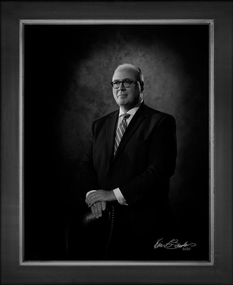 Manual hyperrealism portrait of Eddie Aldrete, Senior Vice President of IBC Bank, captured in-person at 107 Blue Star by Kevin G. Saunders.