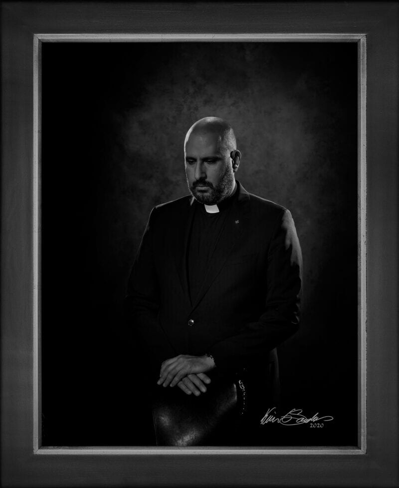 Manual hyperrealism portrait of Fr. Charles Khachan, MLM, Pastor of St. George Maronite Catholic Church, captured in-person at 107 Blue Star by Kevin G. Saunders.