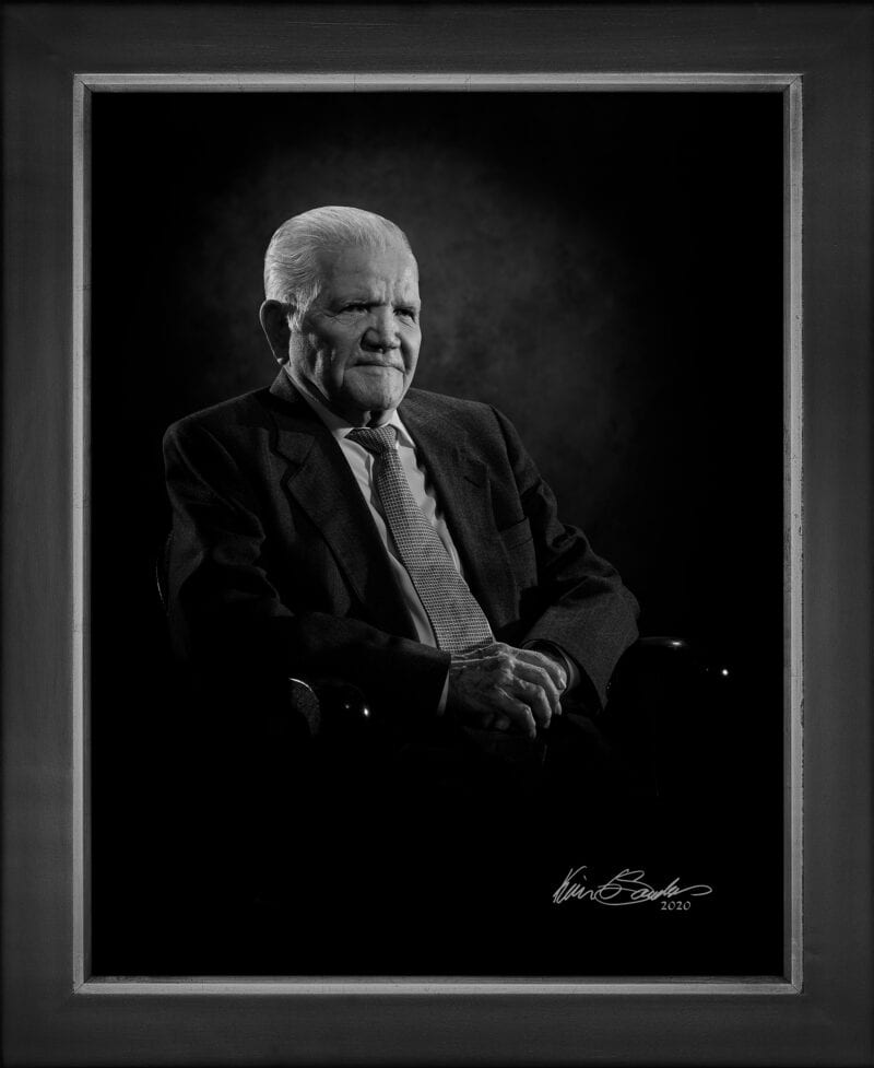 Manual hyperrealism portrait of the Honorable Joe J. Bernal, Former State Senator, captured at 107 Blue Star by Kevin G. Saunders.