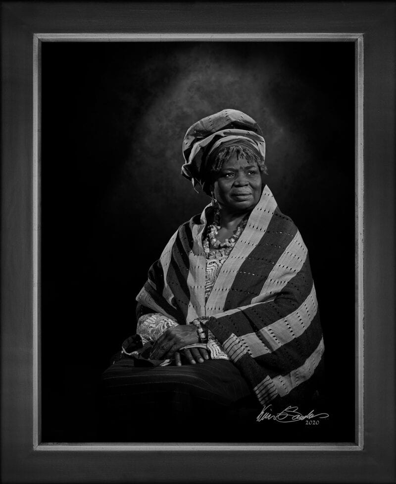 Manual hyperrealism portrait of Shetigho Nakpodia, Pastor of Redeemer's Praise Church, captured in-person at 107 Blue Star by Kevin G. Saunders.