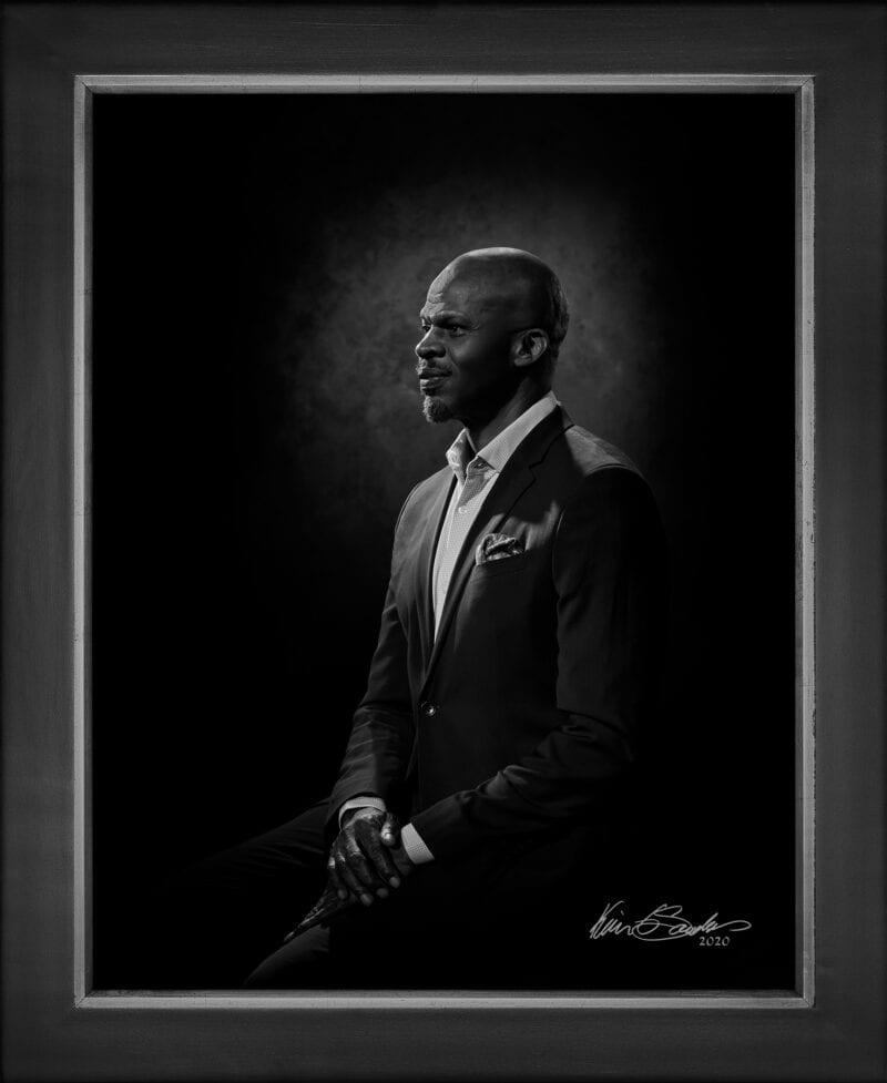 Manual hyperrealism portrait of Shokare Nakpodia, Founder of DreamVoice and DreamWeek San Antonio, captured in-person at 107 Blue Star by Kevin G. Saunders.