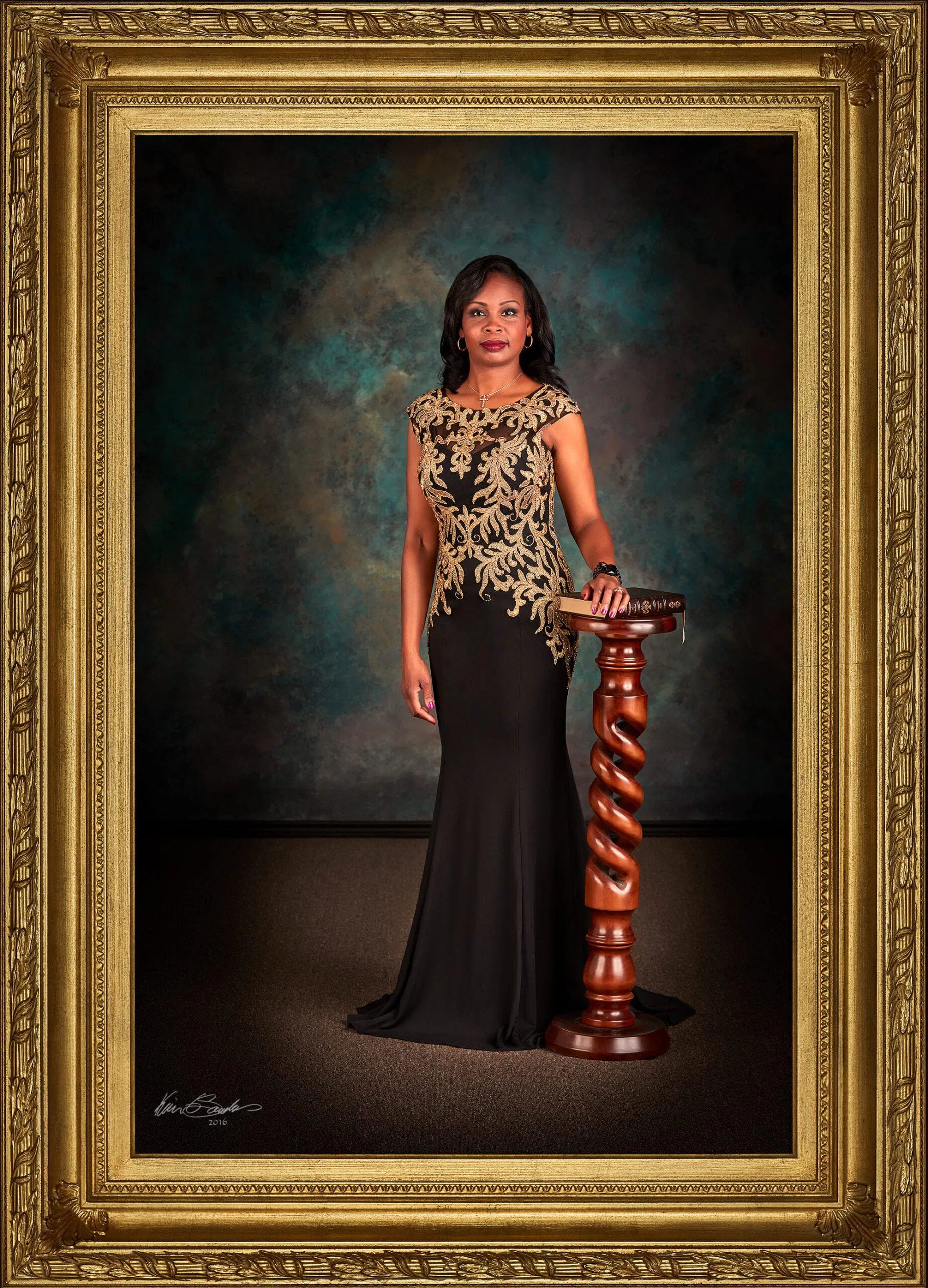 A detail of a fine art portrait showing the masterful use of Chiaroscuro light on the gown of Dr. Ivy R. Taylor.