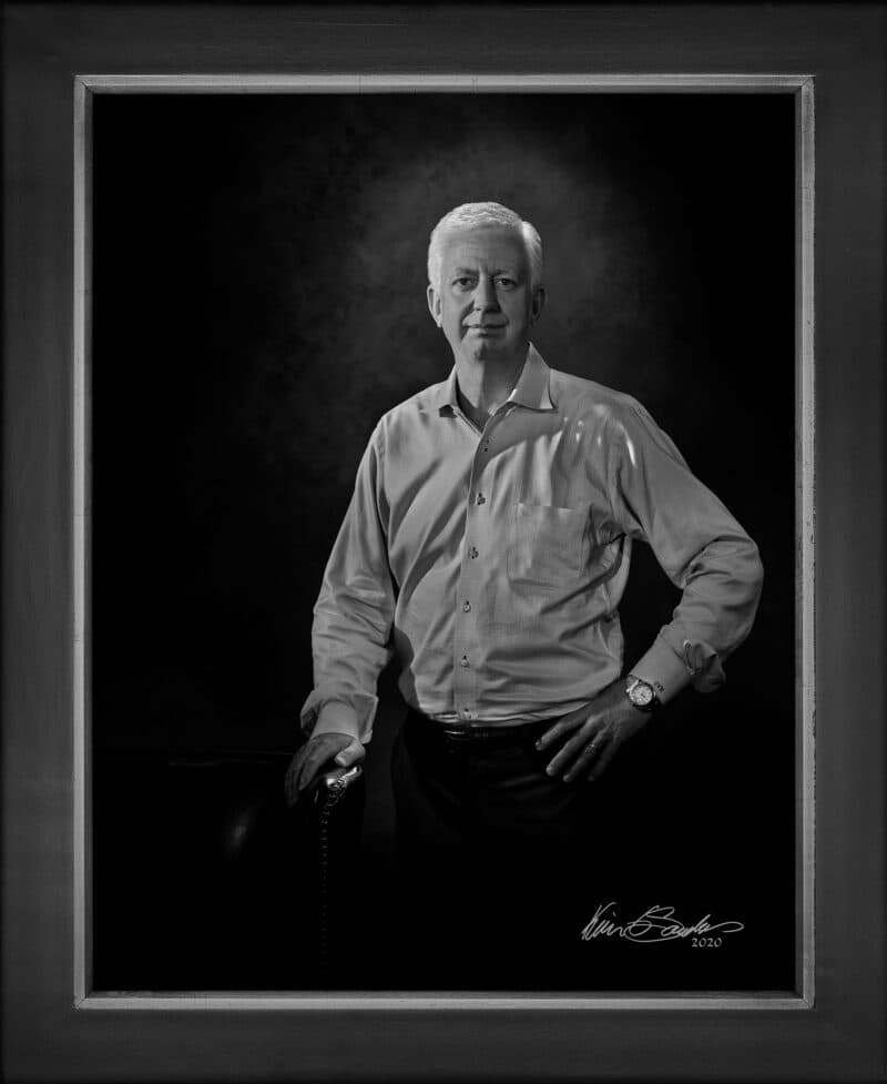 Manual hyperrealism portrait of Gordon Hartman, Founder of Morgan’s Wonderland, captured in-person at 107 Blue Star by Kevin G. Saunders.