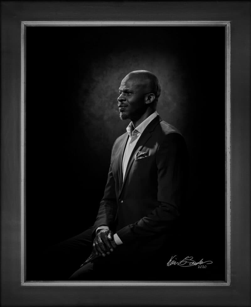 Manual hyperrealism portrait of Shokare Nakpodia, Founder of DreamVoice and DreamWeek San Antonio, captured in-person at 107 Blue Star by Kevin G. Saunders.