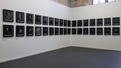 An exhibit wall at the Brick Event Center featuring the KGS Studios 