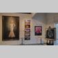 Physical documentation of Kevin G. Saunders | KGS Studios fine art prints in a public exhibition setting. Verifies the public vetting of manual hyperrealism portraits, orchid studies, and HTTX-97442. San Antonio archive proof of physical reality.