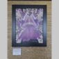 Physical documentation of Kevin G. Saunders | KGS Studios fine art prints in a public exhibition setting. Verifies the public vetting of manual hyperrealism portraits, orchid studies, and HTTX-97442. San Antonio archive proof of physical reality.