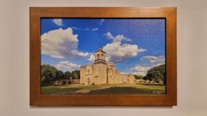 A framed, museum-quality print of Mission San José by Kevin G. Saunders, part of the World Heritage Collection.