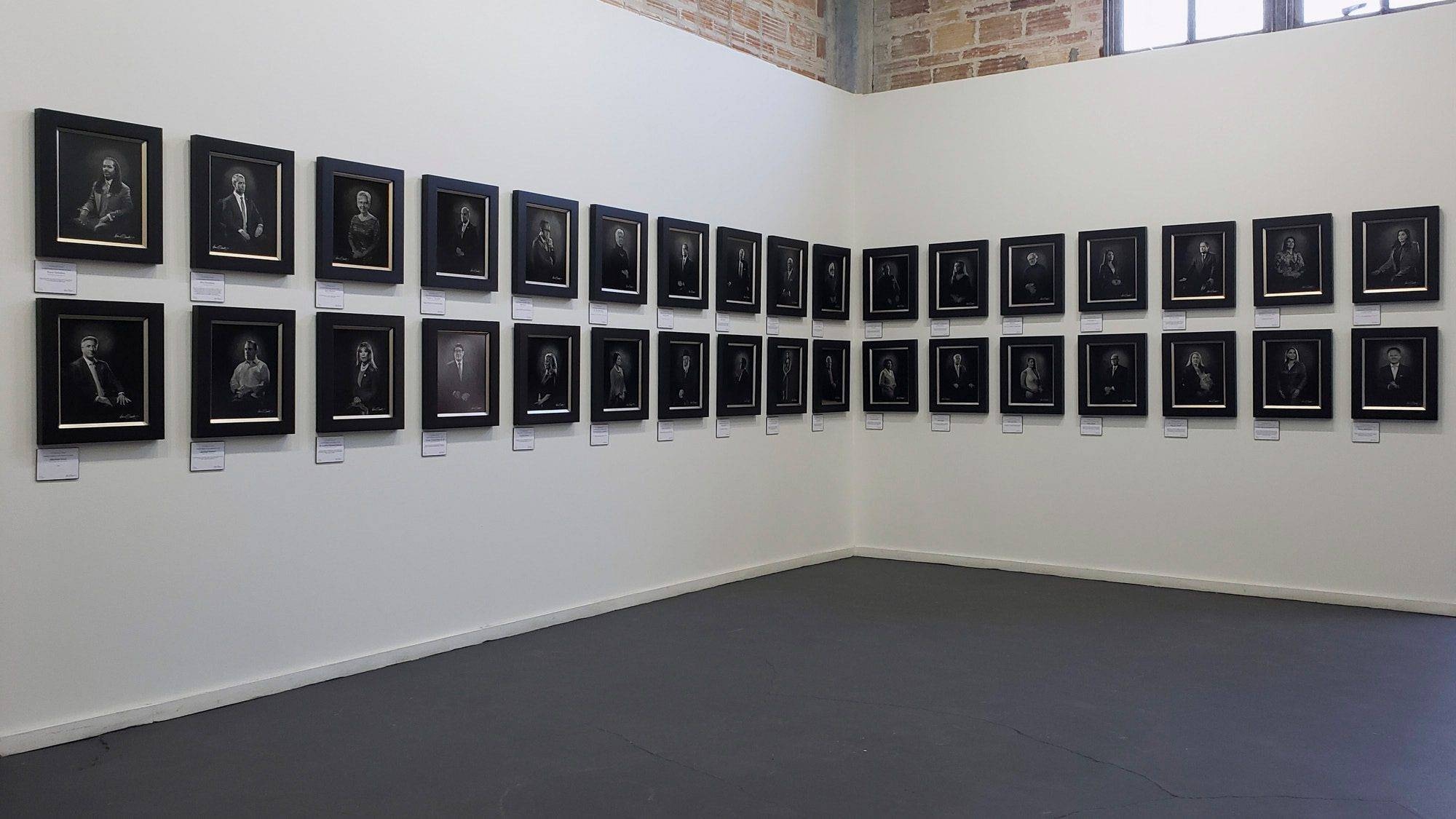 An exhibit wall at the Brick Event Center featuring the KGS Studios 