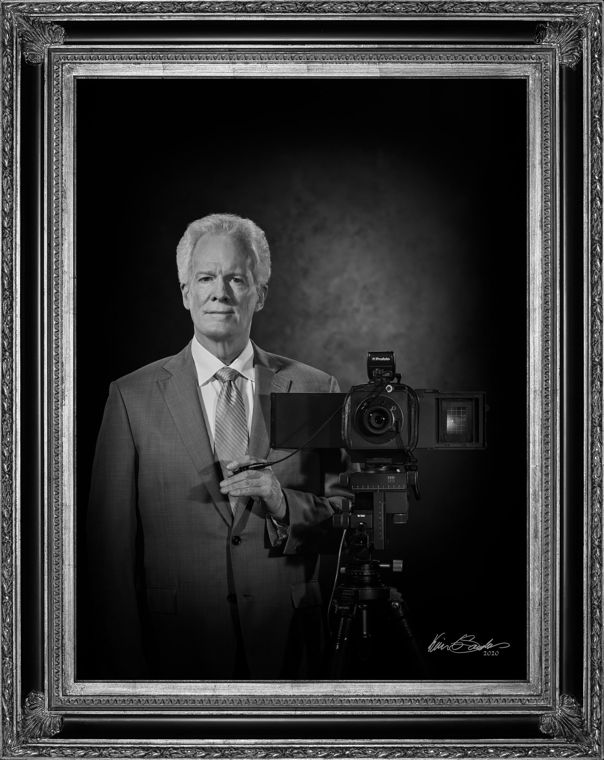 A professional black and white self-portrait of Kevin G. Saunders, Master Portrait Artist.