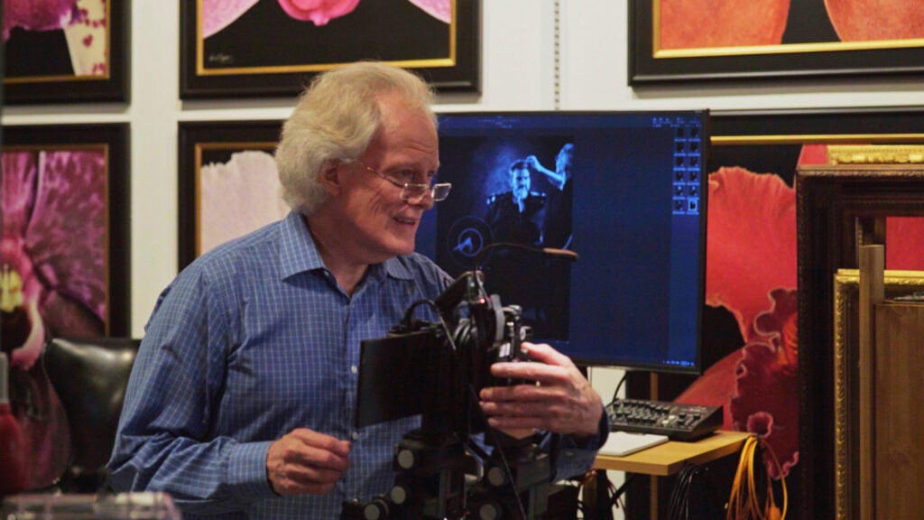 Master Portrait Artist Kevin G. Saunders working with his medium format view camera in his San Antonio studio, demonstrating the process of fine art portraiture.