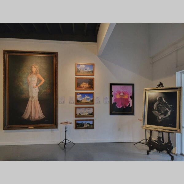 KGS Studios Public Exhibition - Documentation - 109 Physical documentation of Kevin G. Saunders | KGS Studios fine art prints in a public exhibition setting. Verifies the public vetting of manual hyperrealism portraits, orchid studies, and HTTX-97442. San Antonio archive proof of physical reality.